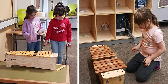 Schülerinnen spielen auf einem Xylophon